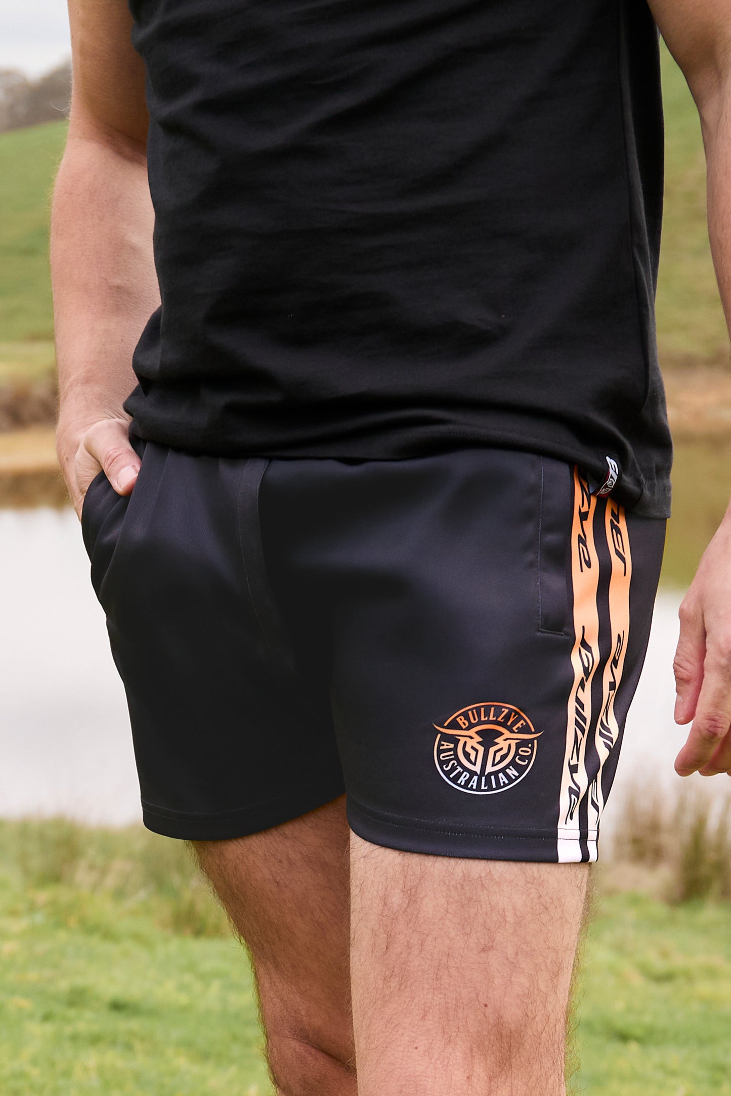 Bullzye Mens Bullring Footy Shorts - Black / Orange