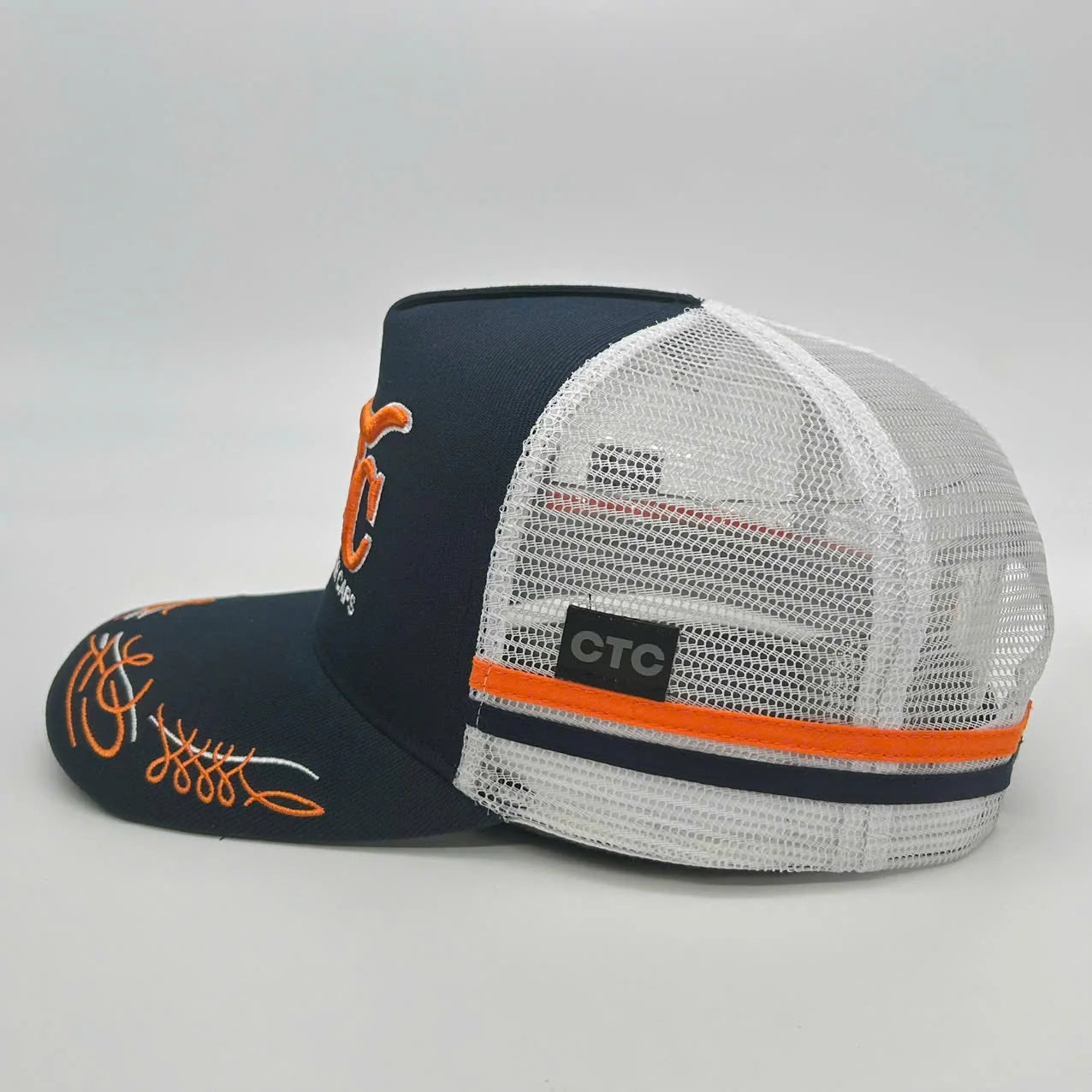 CTC Navy + Orange Scroll Trucker Cap